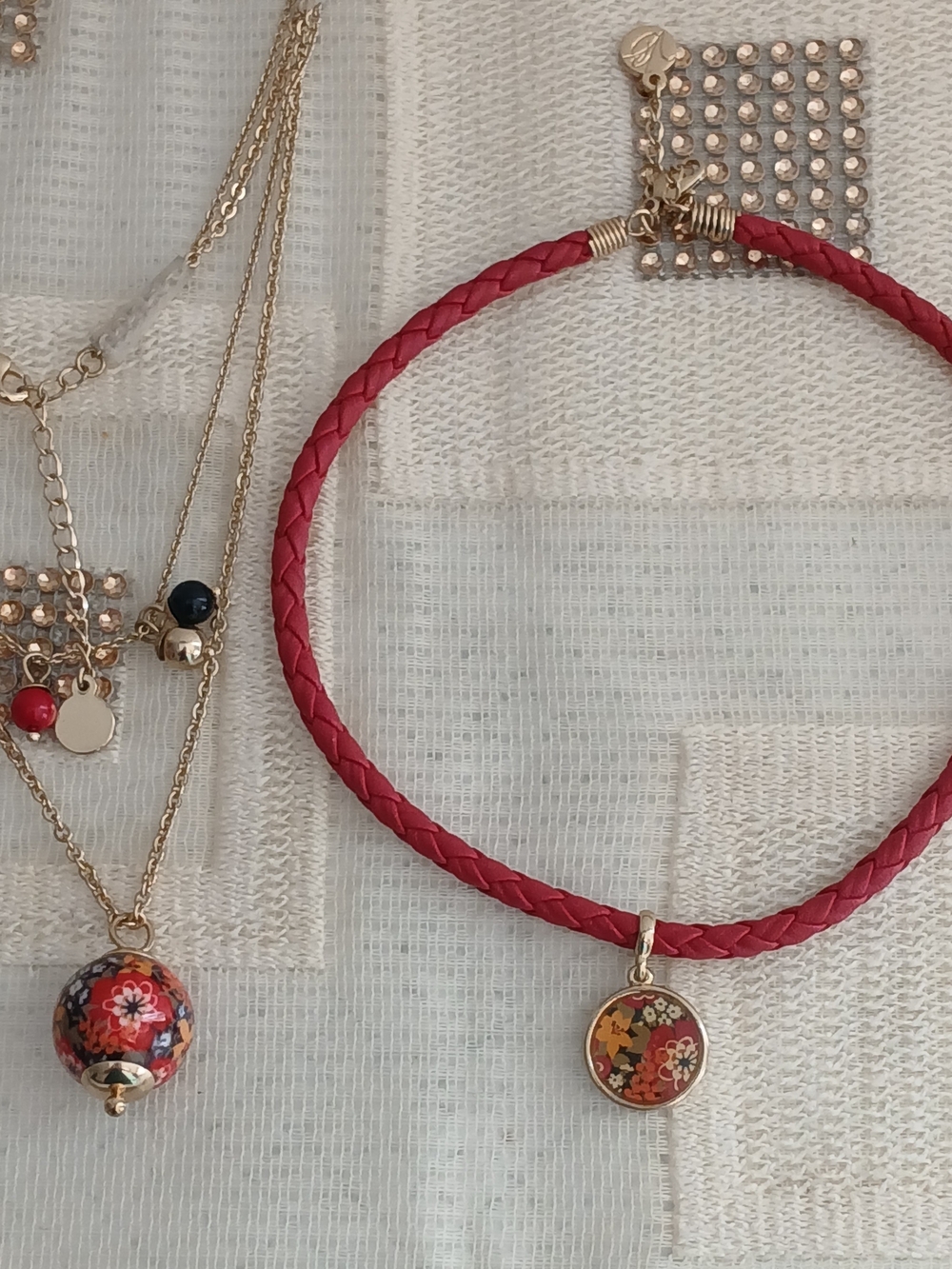 VERA BRADLEY RED AND GOLD CHARM NECKLACES